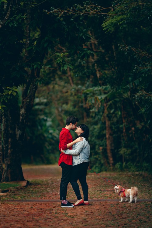 couple with puppy